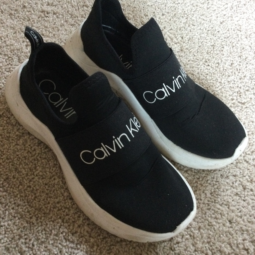 Calvin Klein black slip on sneakers, size 6